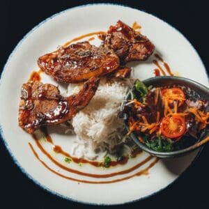 Grilled lamb ribs served at our Asian restaurant in Lisbon