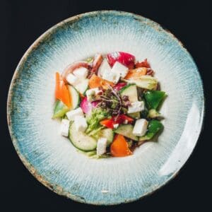 Fresh salad – side at Asian restaurant Lisbon - Fresh salad made with greens and seasonal fruits