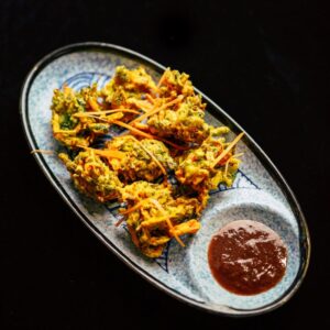 Cozinha asiática em Lisboa - Legumes envolvidos em polme de especiarias e fritos até dourados