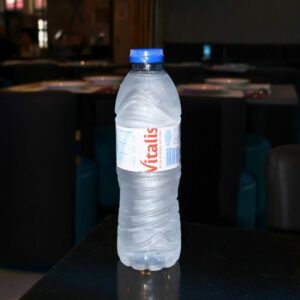 Bottled water served – refreshing drink at Asian restaurant Lisbon