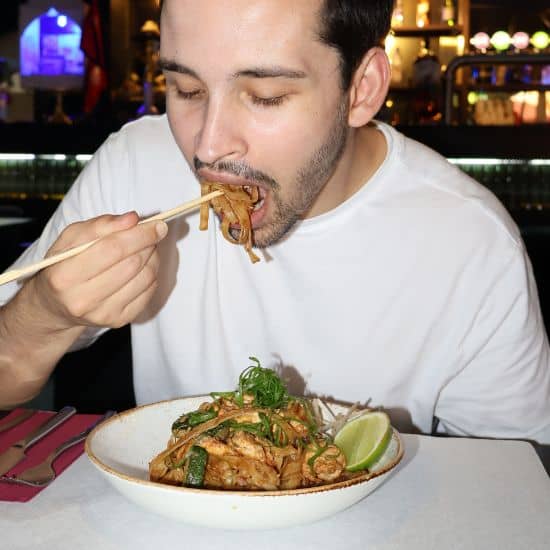 Pad Thai being enjoyed by a customer – Asian food Lisbon experience
